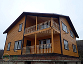 Дом из бруса 11 на 9,7 м в полтора этажа.