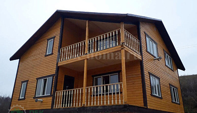 Дом из бруса 11 на 9,7 м в полтора этажа.