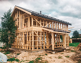Каркасный двухэтажный дом 10 на 10 м. с эркером.