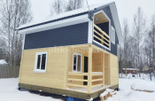 Баня из бруса «Робейка» 6х6 в полтора этажа с террасой